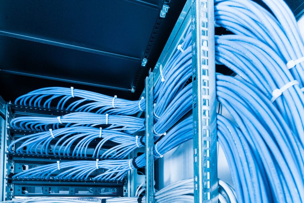 Professional-grade Ethernet cabling by Pro-TechT in server rack.